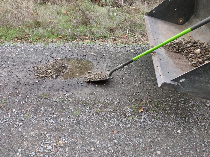 The road without the pothole or puddle anymore