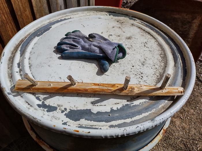 Wedged cut sticks in drilled holes.