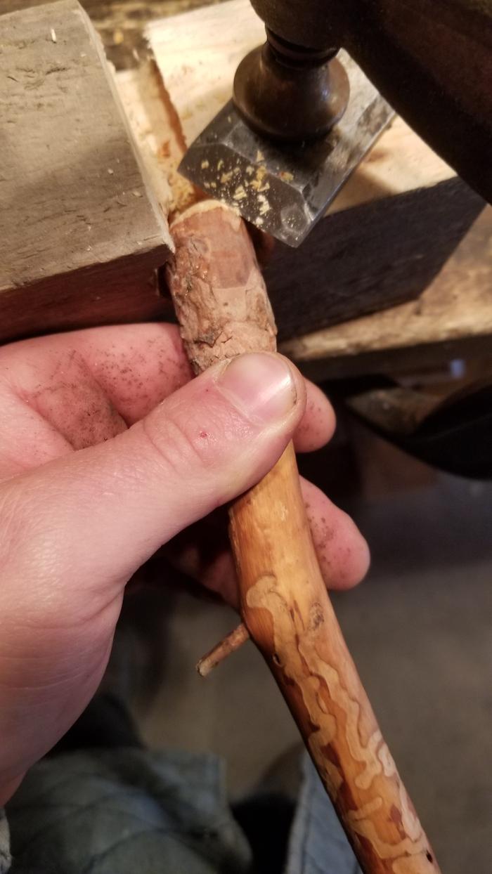 Shaving the dry pegs to a dowel like form